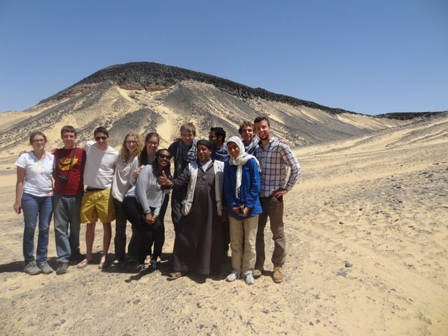 Also known as the Black and White Deserts of the Sahara in Egypt, the group is with a kind local. 